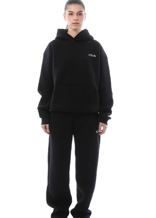 Unisex-Set aus einfarbigen Oversize-Hoodies und Jogginghosen