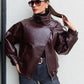 Schwarze Kunstlederjacke mit Stehkragen, übergroße Motorradjacke