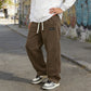 Herrenhose mit lockerer Passform, Kordelzug und Taschen