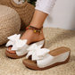 👡 50% RABATT! 🎀 Damen-Bowknot Zehenfreie Keilabsatz-Sandalen – Stilvoll, Bequem & Perfekt für Sommer & Feste 🌸